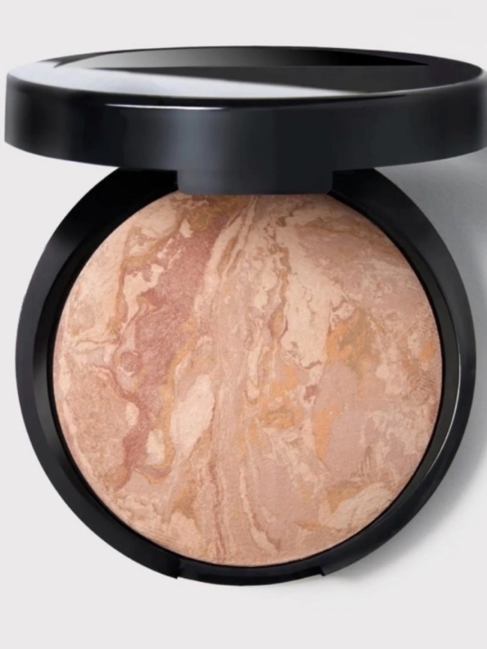 Laura Geller baked balance N brighten color correcting foundation fair